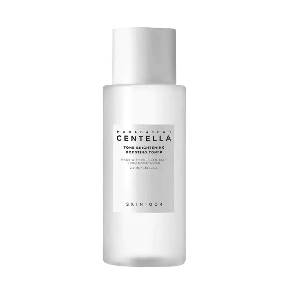 A frosted glass bottle of SKIN1004 Madagascar Centella Tone Brightening Boosting Toner with a white cap, shown on a solid white background.