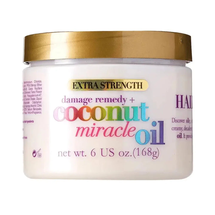 Jar of Extra Strength Damage Remedy Coconut Miracle Oil on a white background